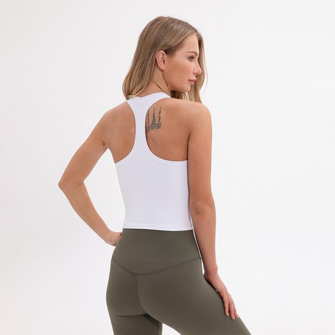Der Longline-Sport-BH Wirefree der Großhandelsfrauen füllte mittlere Stützkundenspezifische Trägershirt-Frauen-weißes Ernte-Trägershirt auf