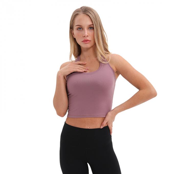Der Longline-Sport-BH Wirefree der Großhandelsfrauen füllte mittlere Stützkundenspezifische Trägershirt-Frauen-weißes Ernte-Trägershirt auf