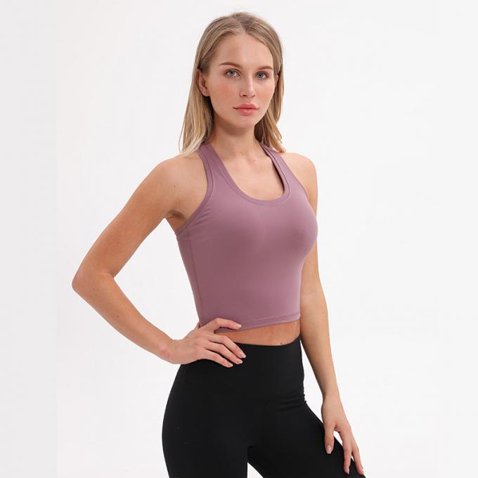 Der Longline-Sport-BH Wirefree der Großhandelsfrauen füllte mittlere Stützkundenspezifische Trägershirt-Frauen-weißes Ernte-Trägershirt auf