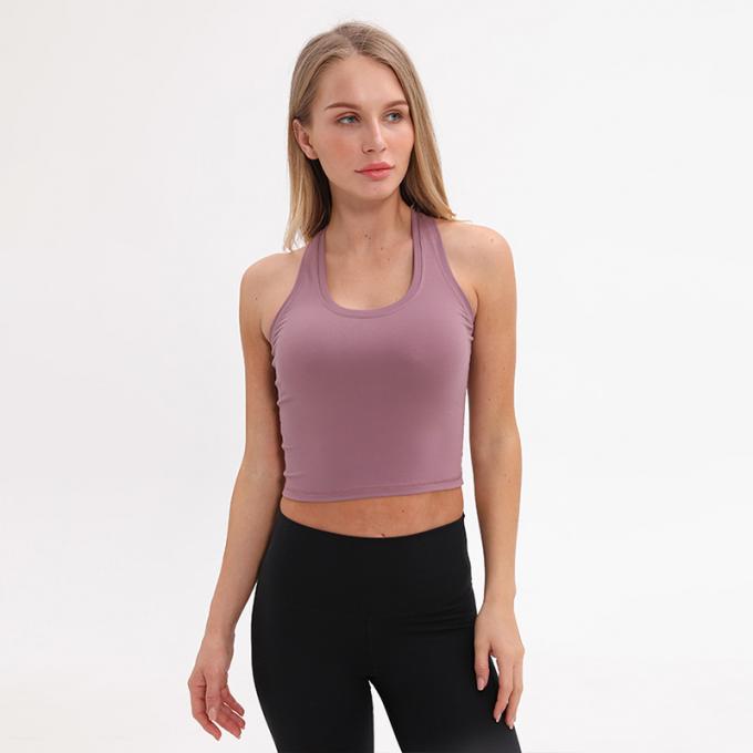 Der Longline-Sport-BH Wirefree der Großhandelsfrauen füllte mittlere Stützkundenspezifische Trägershirt-Frauen-weißes Ernte-Trägershirt auf