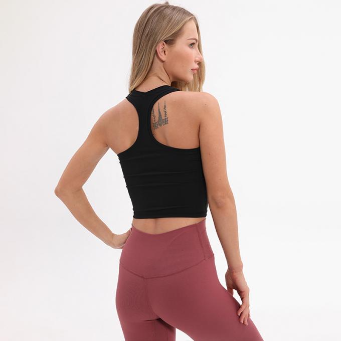 Der Longline-Sport-BH Wirefree der Großhandelsfrauen füllte mittlere Stützkundenspezifische Trägershirt-Frauen-weißes Ernte-Trägershirt auf