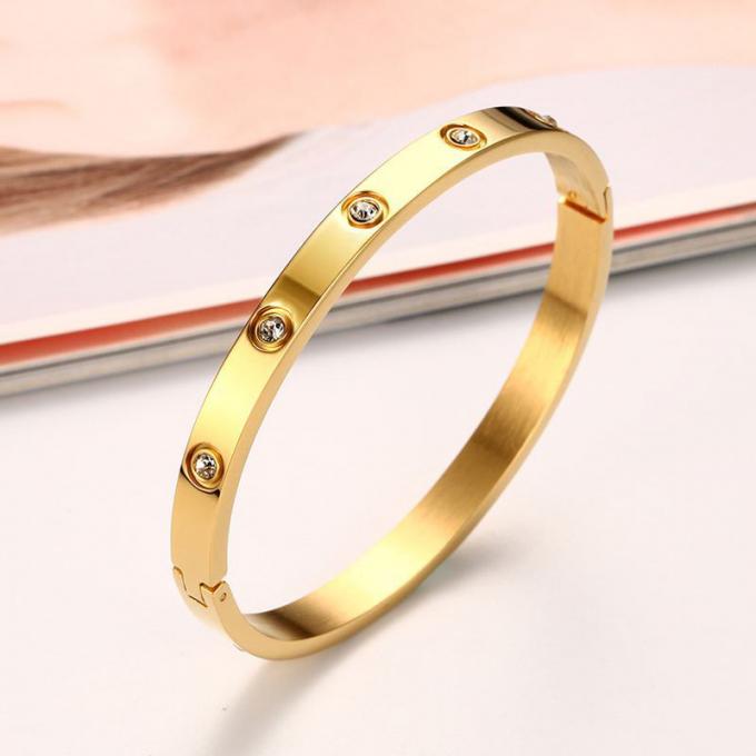 Luxuscharme-Armband-Edelstahl-Damen-Armband- und Ringarmbandfrauengold überzog