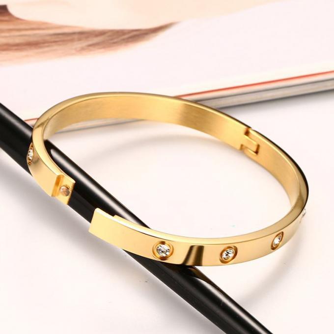 Luxuscharme-Armband-Edelstahl-Damen-Armband- und Ringarmbandfrauengold überzog