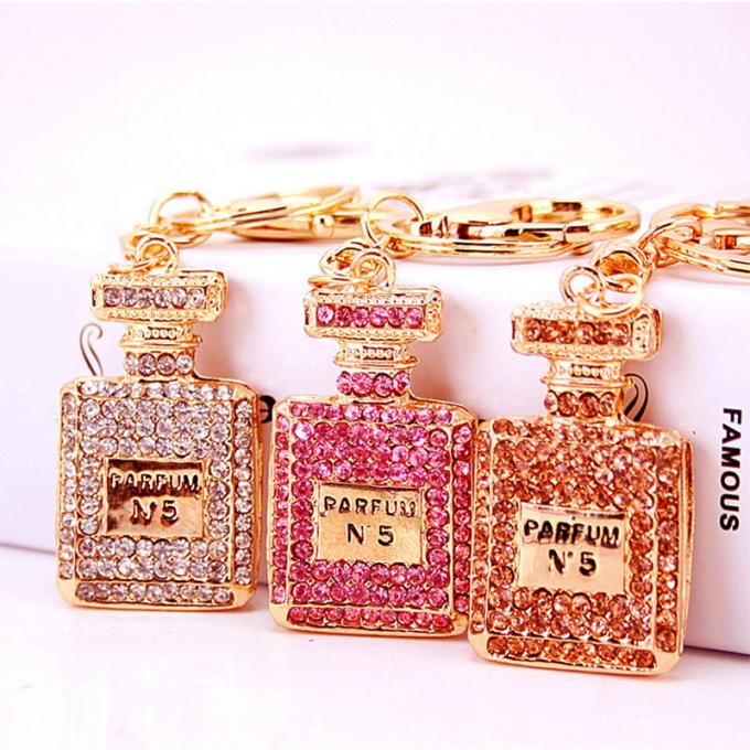 Kreatives Diamant-verziertes Damen-Parfümflascheschlüsselkette weibliches Taschen-Zusatz-Bergkristall-Metall Crystal Keychain