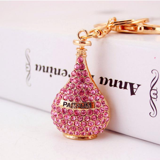 Kreatives Diamant-verziertes Damen-Parfümflascheschlüsselkette weibliches Taschen-Zusatz-Bergkristall-Metall Crystal Keychain