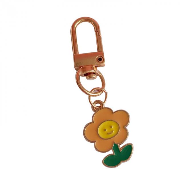 Großhandelskaninchenschlüsselkette kleines Blumen-Metallhängende Tasche verziert Zusatz-nette Karikatur Keychains für Frauen