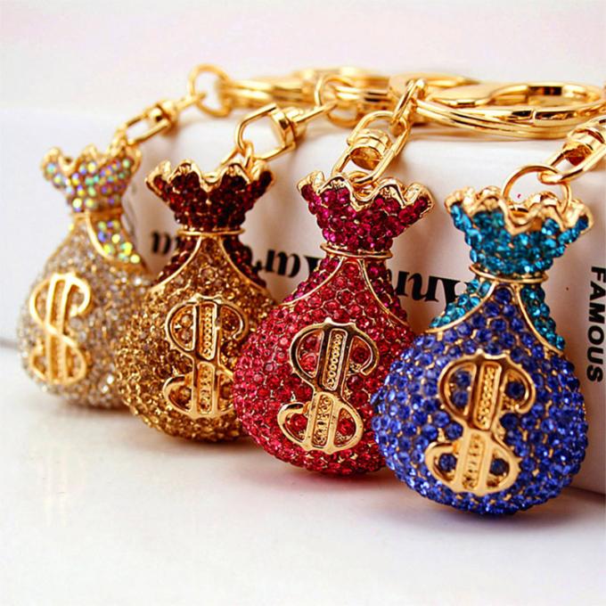 Großhandels-Zusätze Keyhains Diamond Crystal Money Bag Car Keys Ring Metal Pendant Women Bag für Geschenke