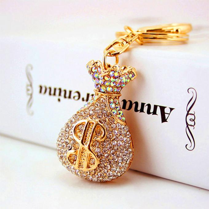 Großhandels-Zusätze Keyhains Diamond Crystal Money Bag Car Keys Ring Metal Pendant Women Bag für Geschenke