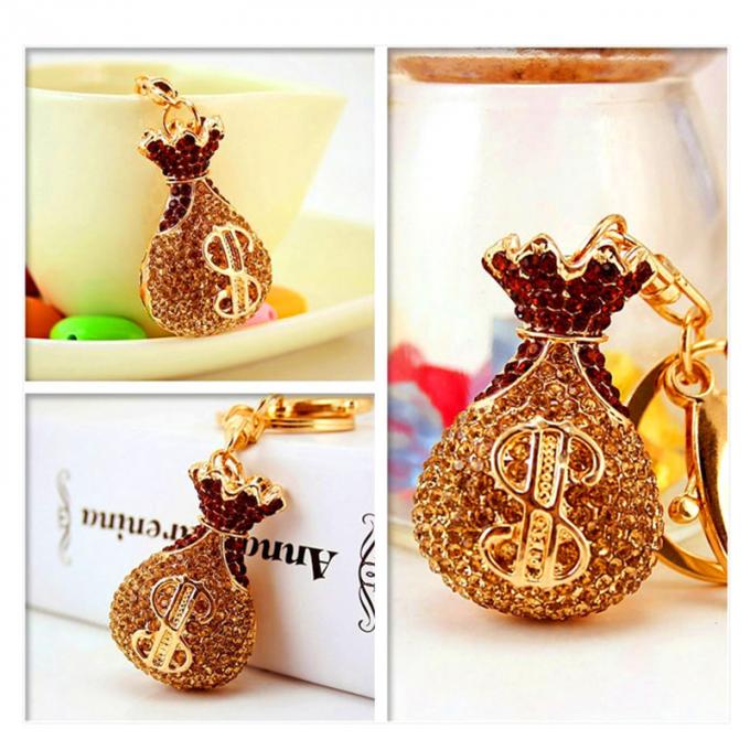 Großhandels-Zusätze Keyhains Diamond Crystal Money Bag Car Keys Ring Metal Pendant Women Bag für Geschenke