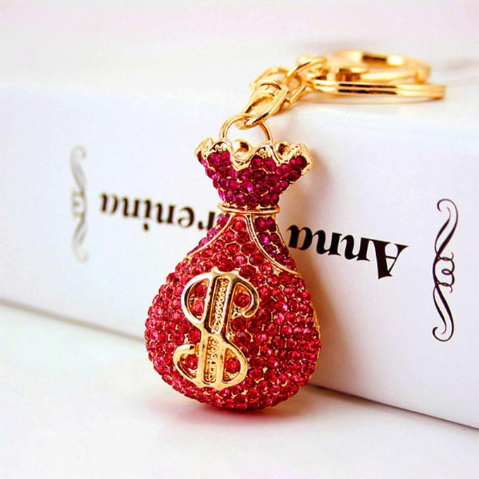 Großhandels-Zusätze Keyhains Diamond Crystal Money Bag Car Keys Ring Metal Pendant Women Bag für Geschenke
