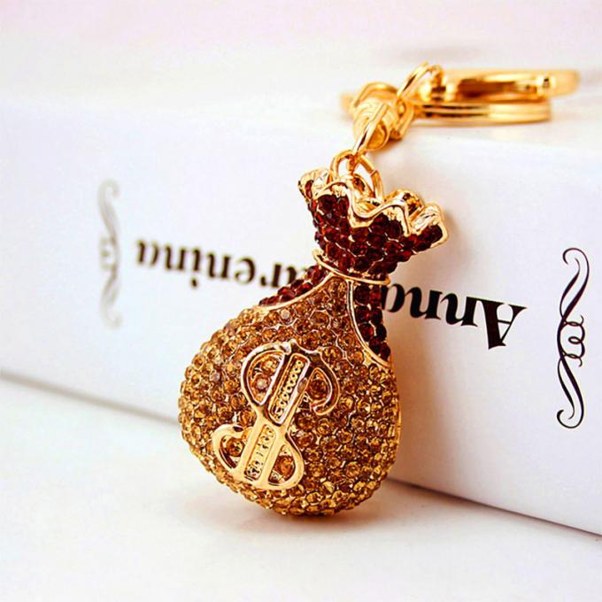 Großhandels-Zusätze Keyhains Diamond Crystal Money Bag Car Keys Ring Metal Pendant Women Bag für Geschenke