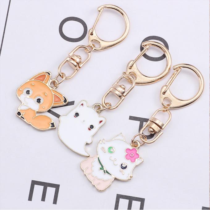 Großhandels- Schlüssel- Ring Metal Pendant Women Bag Zusätze Kristall-Keyhains Diamond Crystal Mermaids Watermelons Moon Cars für Geschenke