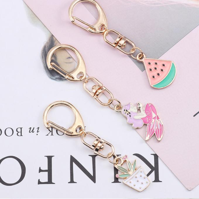 Großhandels- Schlüssel- Ring Metal Pendant Women Bag Zusätze Kristall-Keyhains Diamond Crystal Mermaids Watermelons Moon Cars für Geschenke