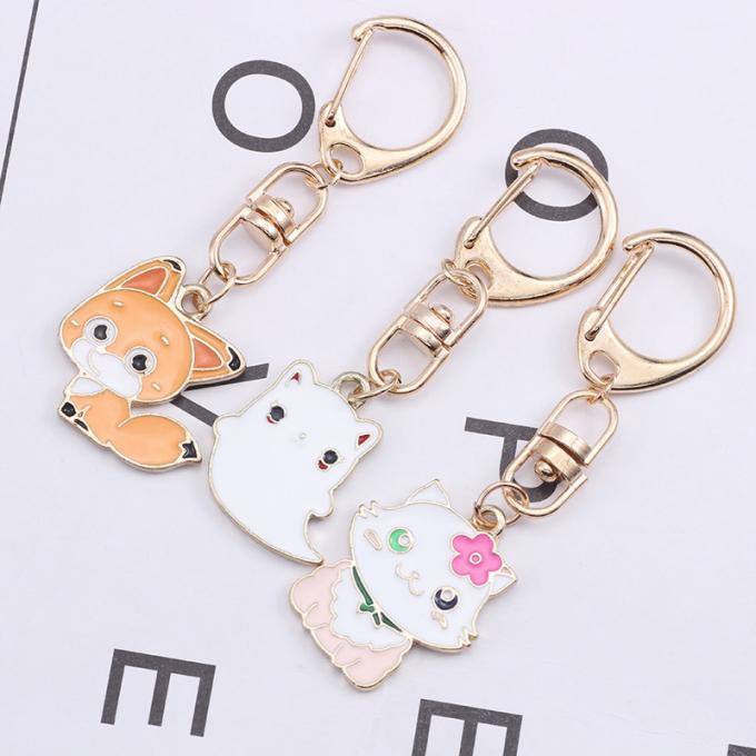 Großhandels- Schlüssel- Ring Metal Pendant Women Bag Zusätze Kristall-Keyhains Diamond Crystal Mermaids Watermelons Moon Cars für Geschenke